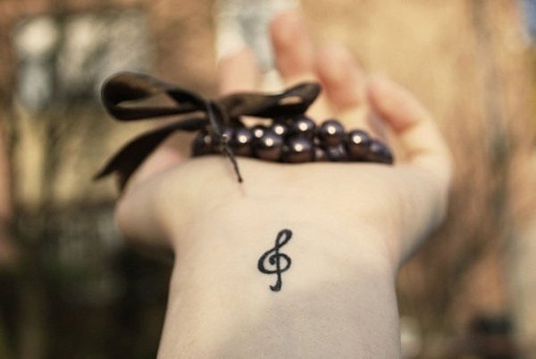 115 Small tattoos with letters and symbols for girls