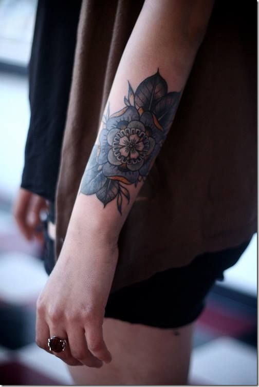 Lovely Exterior Of The Forearm Tattoos