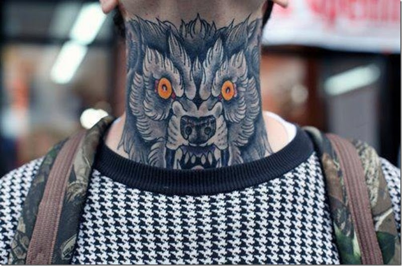Wolf neck tattoo.