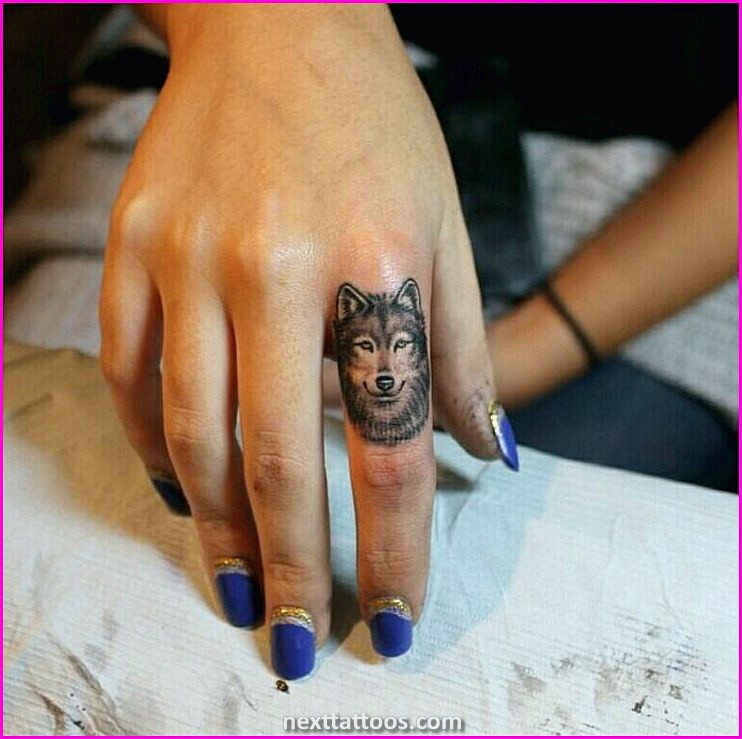 Animal Finger Tattoos - Popular Designs For Small Animal Finger Tattoos