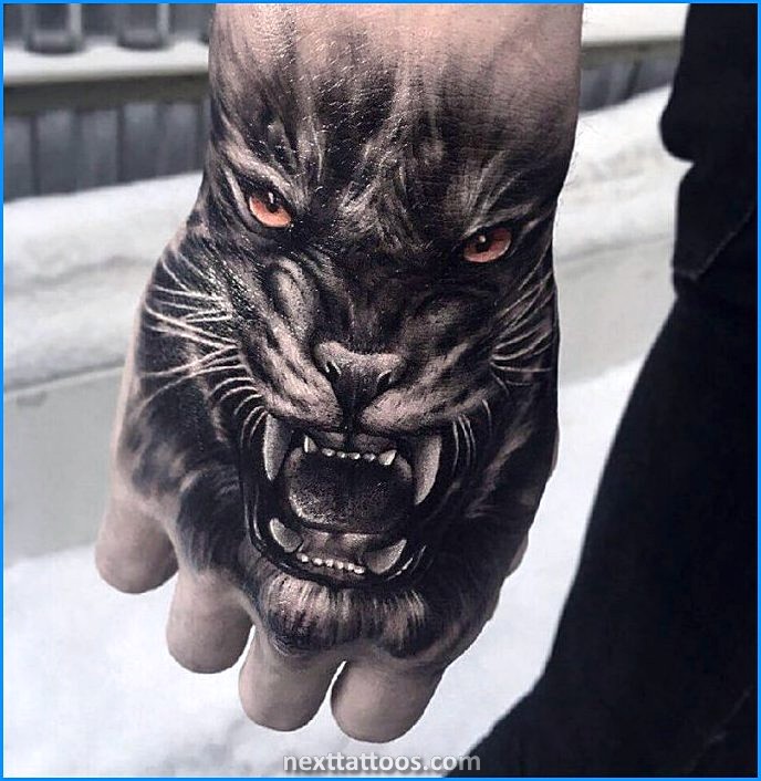 Mens Animal Hand Tattoos With Personal Meanings