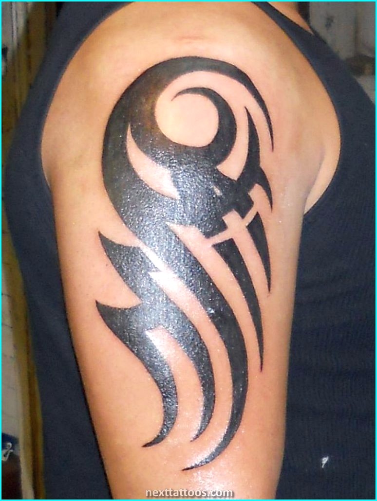 Mens Tribal Arm Tattoos Pictures