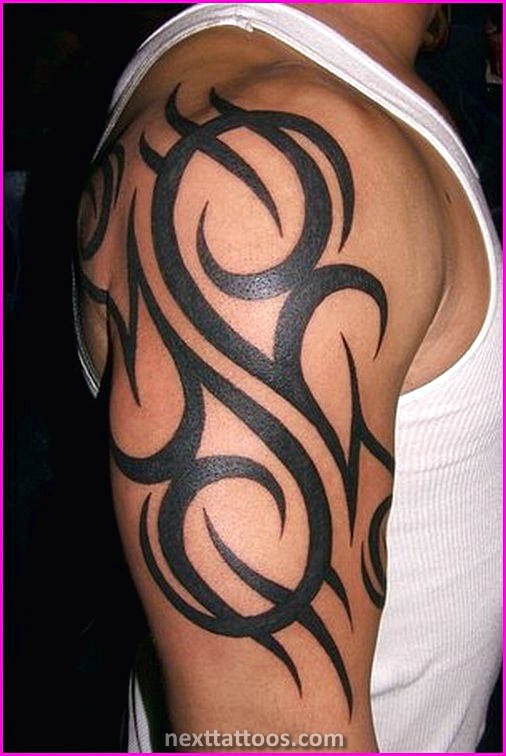 Mens Tribal Arm Tattoos Pictures