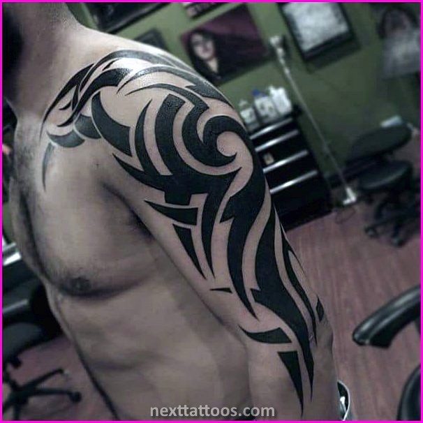 Mens Tribal Arm Tattoos Pictures