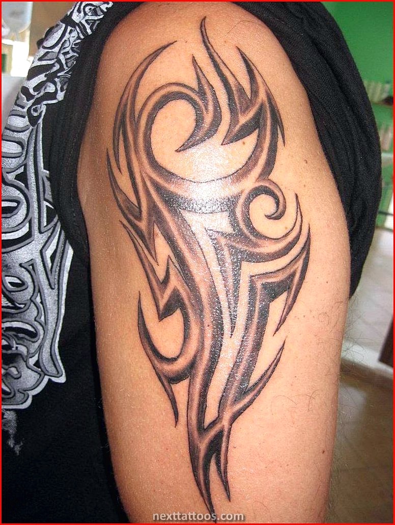 Mens Tribal Arm Tattoos Pictures