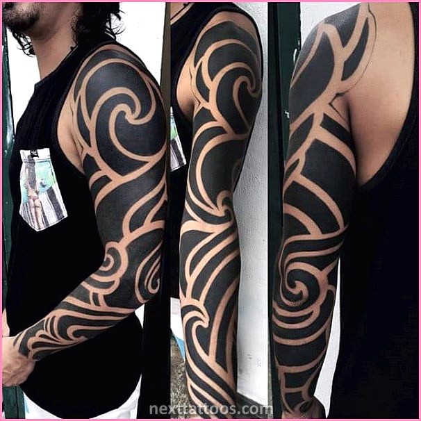 Mens Tribal Arm Tattoos Pictures