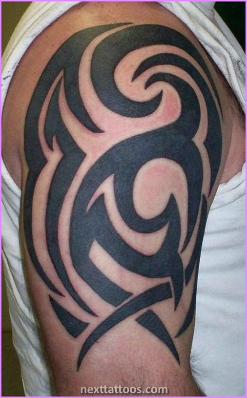 Mens Tribal Arm Tattoos Pictures