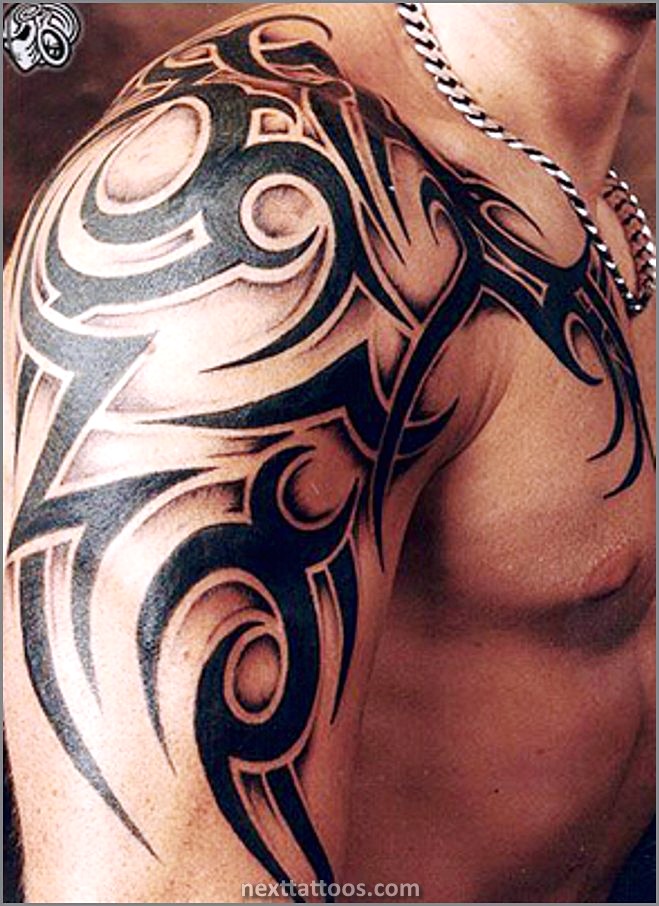 Mens Tribal Arm Tattoos Pictures