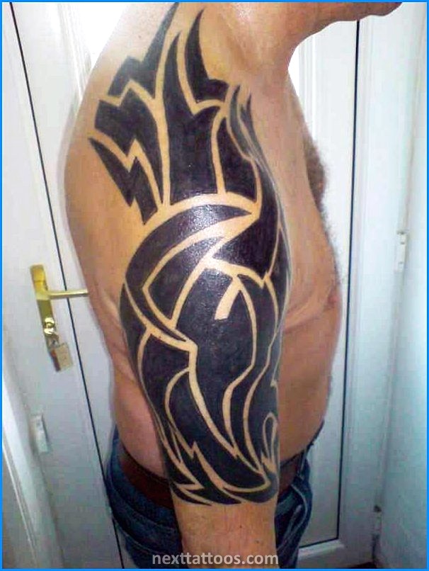 Mens Tribal Arm Tattoos Pictures