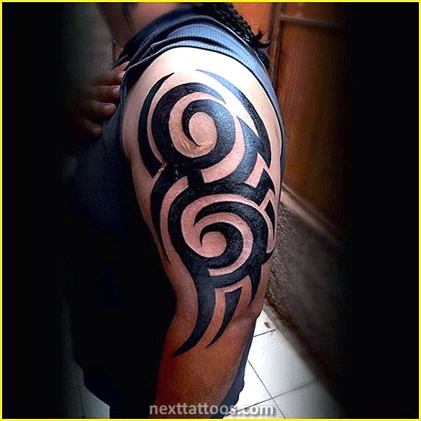 Mens Tribal Arm Tattoos Pictures