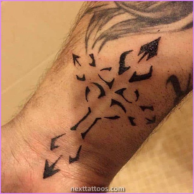 Arm Cross Tattoos - Why Arm Cross Tattoos With Clouds Are Popular