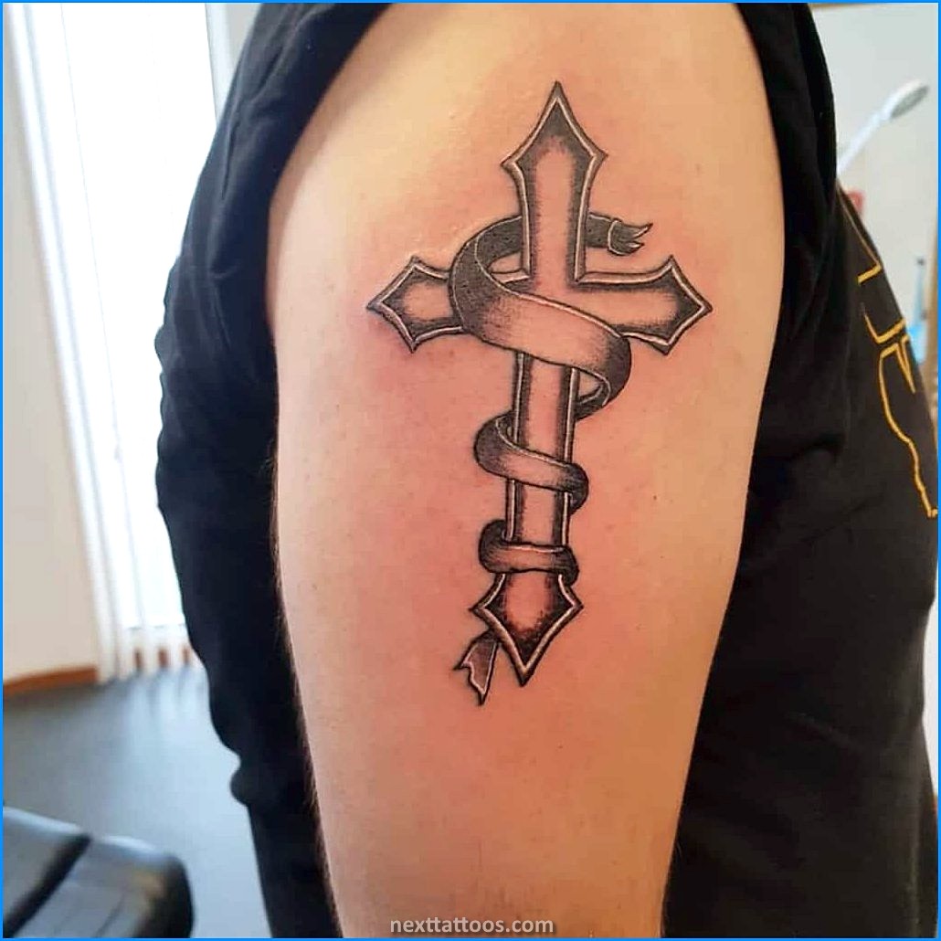 Arm Cross Tattoos - Why Arm Cross Tattoos With Clouds Are Popular