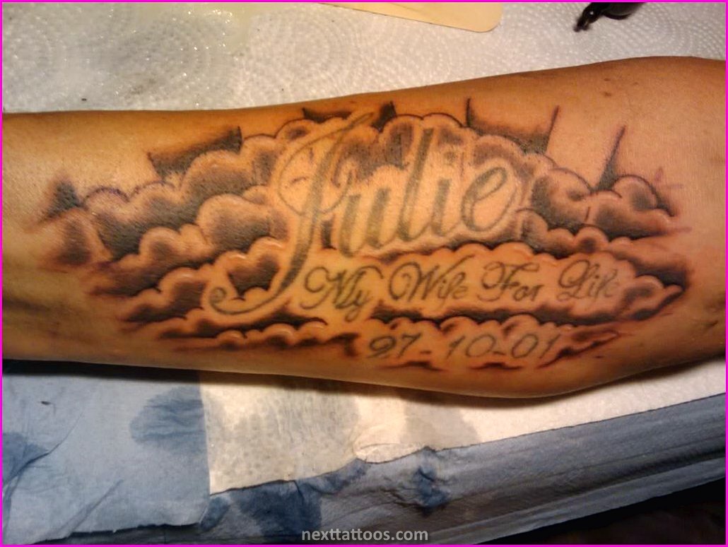 Men's Cloud Tattoos On Upper Arm