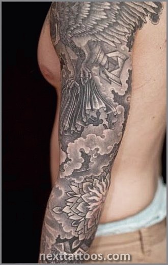 Men's Cloud Tattoos On Upper Arm
