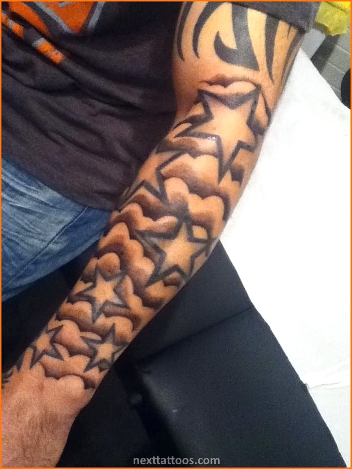 Men's Cloud Tattoos On Upper Arm