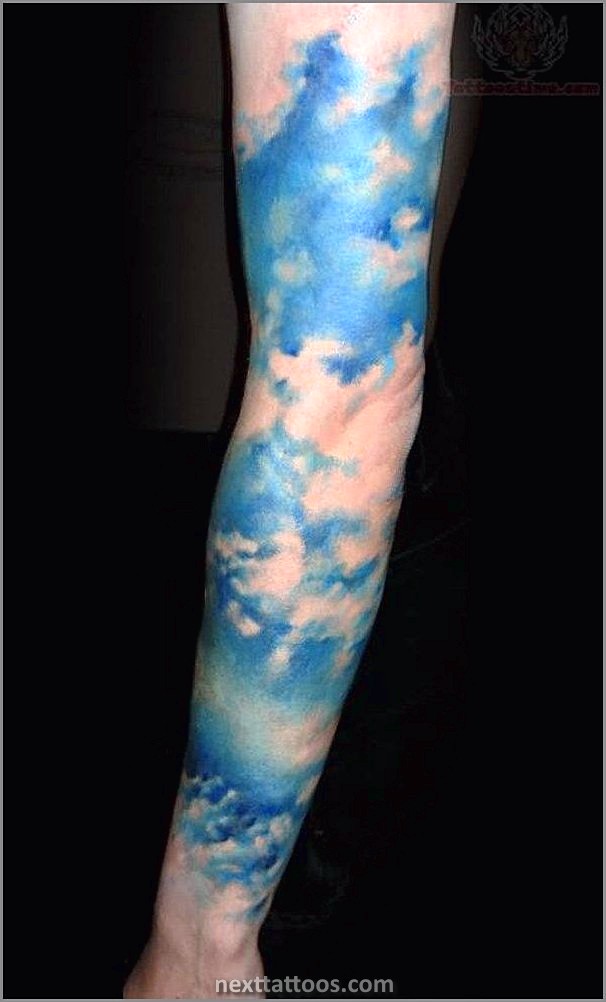 Men's Cloud Tattoos On Upper Arm