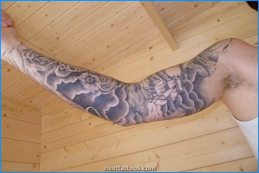 Men's Cloud Tattoos On Upper Arm