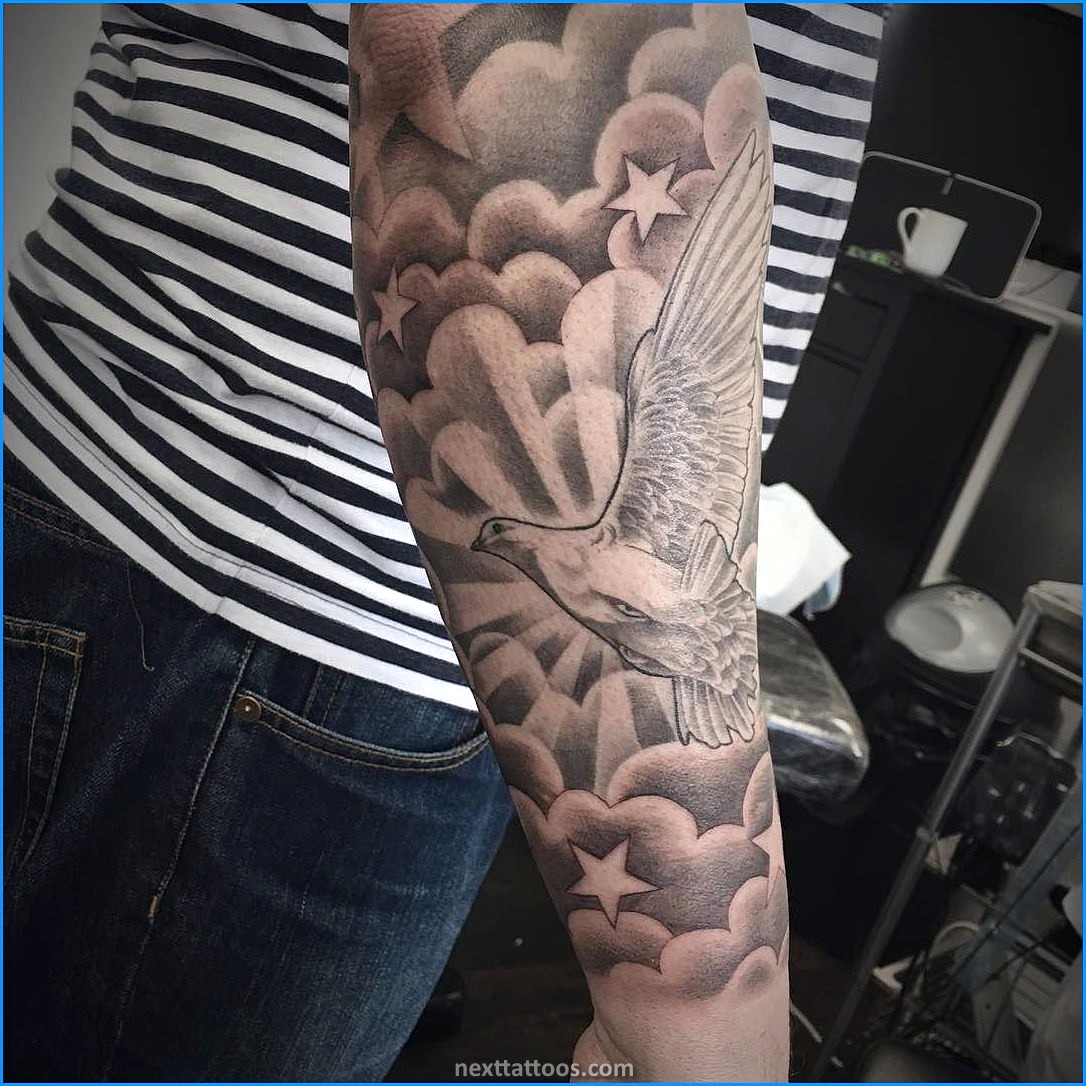 Men's Cloud Tattoos On Upper Arm