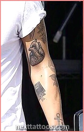 Harry Styles Arm Tattoos 2022