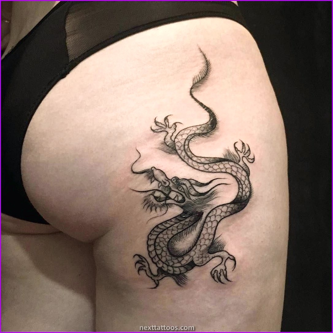 Значение тату дракона у девушки. Тату дракон. Тату дракон на бедре. Татуировка дракон женская. Тату дракон для девушек.
