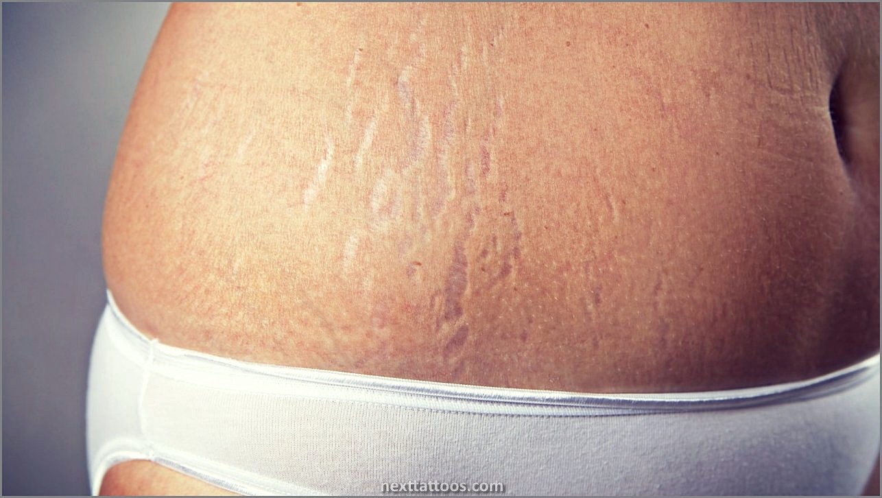 Stretch Mark Stomach Tattoos For Females