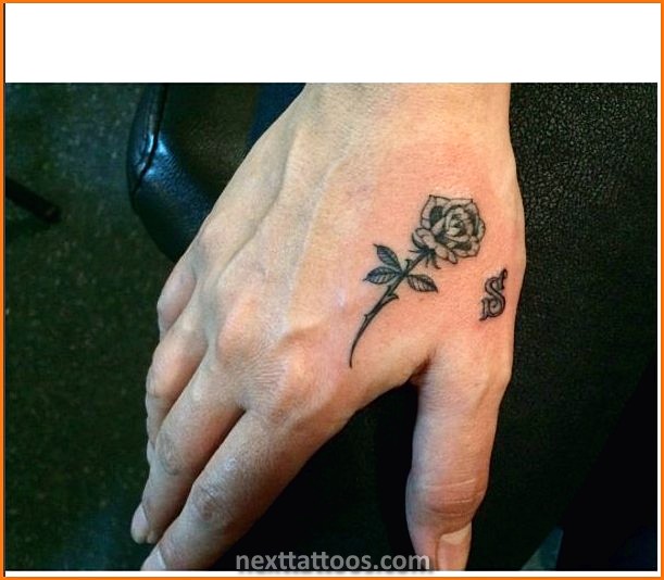 Small Male Hand Tattoos