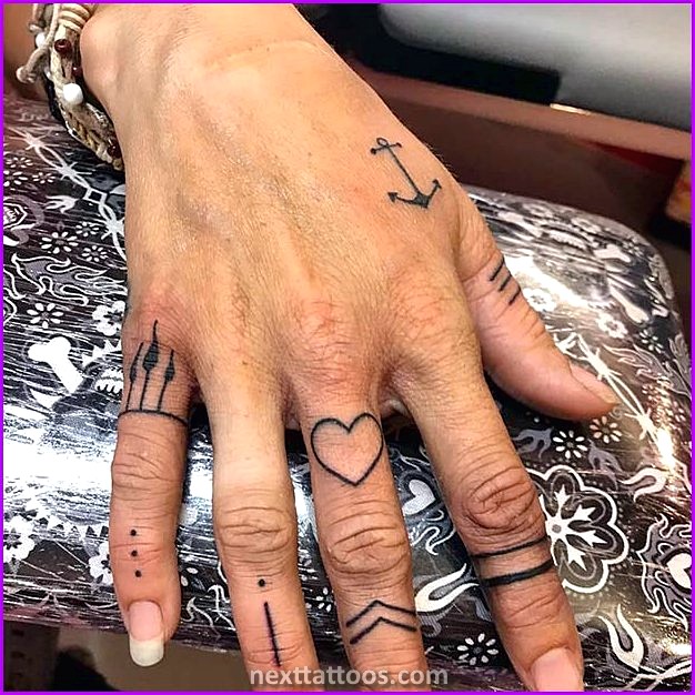 Small Male Hand Tattoos