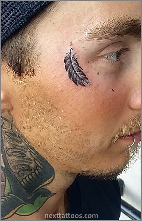 Classy Small Face Tattoos Male