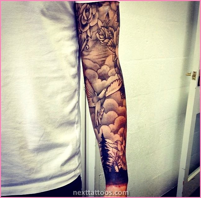 Men's Cloud Tattoos On Upper Arm